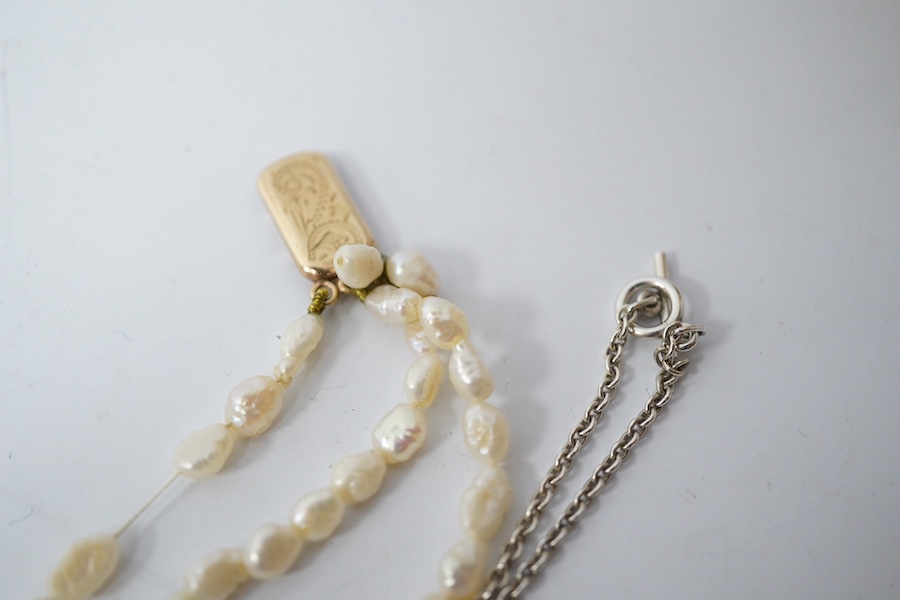 A modern 925 bracelet bearing the word 'Tiffany', together with a freshwater pearl necklace with 9ct gold clasp, a white metal mesh link necklace, a Danish 925 pendant on chain and seven other items including a lady's 9c